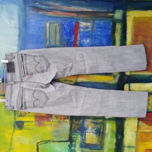 Levi's 511 faded black factory distressed jeans with zippered back pockets above